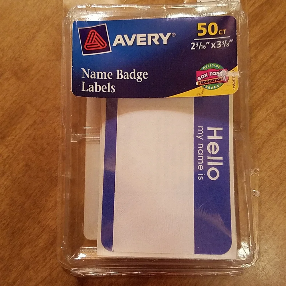 Twelve Avery name badge labels